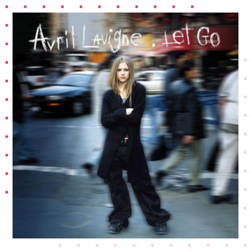Avril Lavigne's Let Go album cover that has a woman standing in the middle with a street blurried behind her