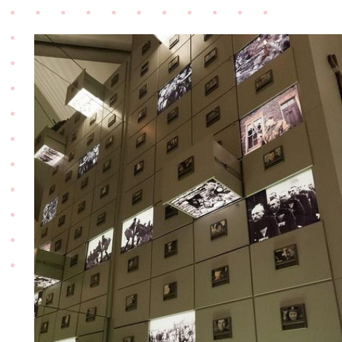 A series of archive cabnets that have digtal images on it