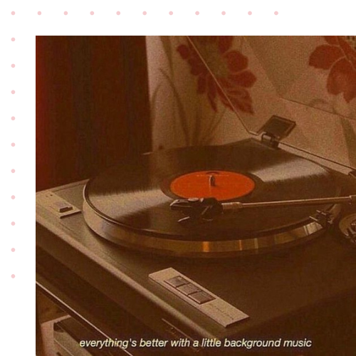 A recordplayer with a vintage filter on top of the photo