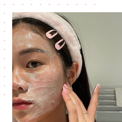A girl washing her face